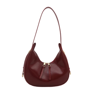 Fashionable dark red patent leather underarm shoulder bag with golden double zipper design