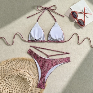 Detailed view of pink leopard print bikini set with removable pads and side tie bikini bottom