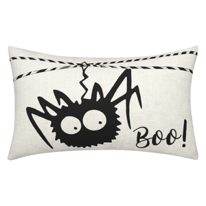 Detail of linen Halloween pillowcase with hanging spider graphic and Boo text