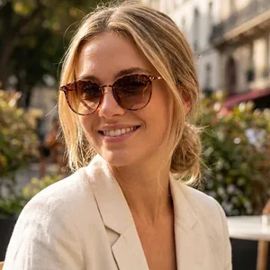 Classic round tortoiseshell sunglasses with metal accents for a retro aesthetic look