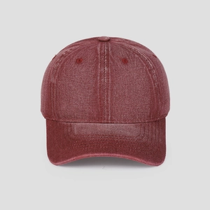 Vintage washed burgundy baseball cap with a classic curved brim and six-panel crown design