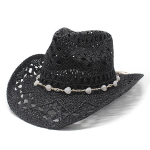Hollow straw cowboy hat with heart bead band in black from 45 degree angle view