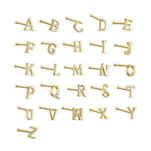 Polished gold S925 sterling silver initial nose studs set from A to Z on white background