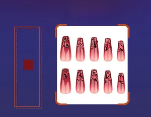 Detail of glitter gradient burgundy coffin press-on nails with 3D red rhinestones