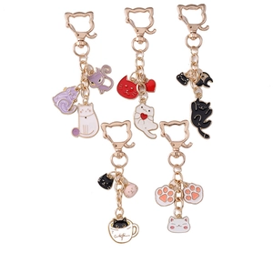 Detailed set of five enamel cat keychains with cat-shaped hooks and gold-tone chains