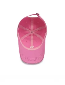 Detailed interior of pink cotton baseball cap showing seams, eyelets, and metal buckle