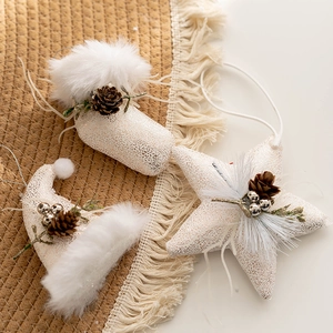 Nordic Christmas star and stocking ornaments with gold glitter and faux fur details