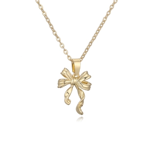 Minimalist gold bow pendant necklace for women with polished finish and elegant metal chain