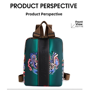 Front view of green chic backpack featuring traditional dragon embroidery and leather strap