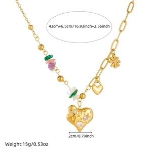 Vintage gold heart pendant necklace with colorful crystal beads and gemstones