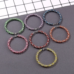 Macro view of colorful 5mm stainless steel Byzantine chain bracelets with lobster clasps