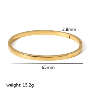 Detail showing 18k gold plated bangle dimensions with 3.8mm thickness and 65mm diameter