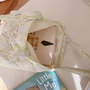 Quilted floral cotton tote bag with Simple Wish label showing spacious interior for books
