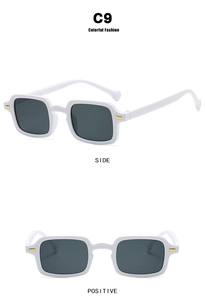Detail view of white square sunglasses showing side and front view with metal accents