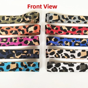 Detail view of colorful leopard print nylon straps with metal hooks in ten vivid colors