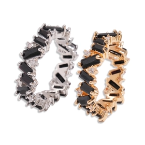 Irregular geometric ring set with black rectangular stones and white zircons in gold and silver