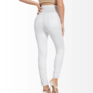 Rear view of white maternity skinny jeans featuring high waist belly support design