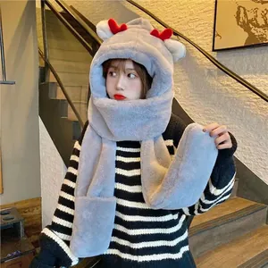 Detail of plush grey hooded scarf featuring cute red antlers and soft fuzzy texture