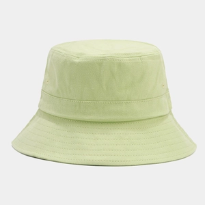 Detail view of mint green cotton bucket hat showing reinforced brim and breathable eyelets