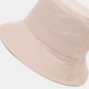 Detail shot of beige quick-dry nylon sun hat featuring precise parallel brim stitching