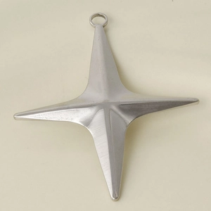 Detailed macro shot of a 304 stainless steel silver star pendant with metal texture