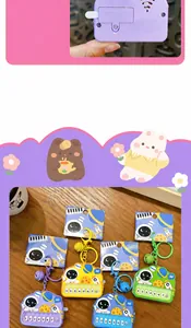 Mini astronaut toy piano keychain detail with four color variants and cute designs