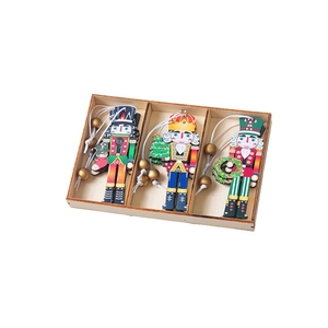 Three-piece wooden nutcracker soldier Christmas ornaments in a gift box with white strings