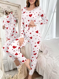 Detail of soft ribbed texture and red heart print on the white loungewear set