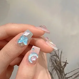 Pastel aurora press-on nails with 3D butterfly, moon and star glitter decorations