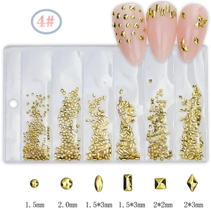 Detailed view of gold metal nail art studs in six shapes with precise size dimensions