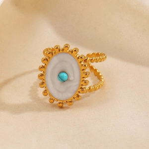 Bague ovale en acier inoxydable doré avec texture marbre blanc et pierre turquoise