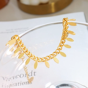 Thai style gold plated stainless steel chain bracelet with oval leaf fringe charms