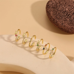 Geometric drop zircon open rings set with colorful stones on elegant pedestal