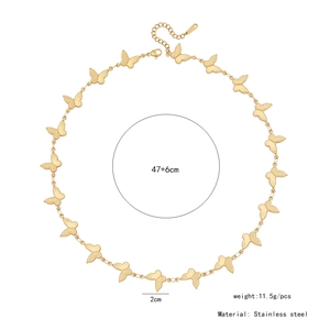 Detailed view of golden butterfly necklace with 47+6cm chain and 2cm pendant dimensions