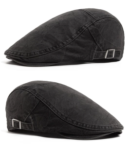 Detailed side view of washed cotton beret featuring vintage texture and adjustable metal buckle