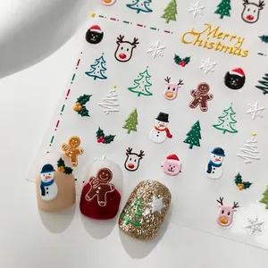 3D embossed Christmas nail art stickers featuring Santa, reindeer, and gingerbread men