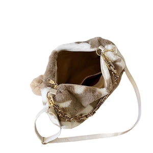 Faux fur leopard print tote bag with gold chain and spacious interior compartment