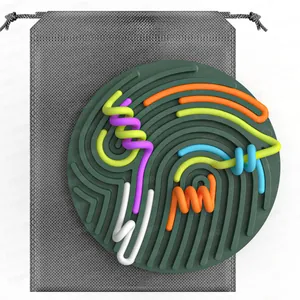 Detailed top view of a green silicone sensory activity board with colorful strings and storage bag