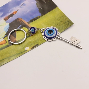 Blue Evil Eye keychain with silver heart metal key charm and resin amulet protection