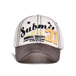 Close-up of vintage baseball cap featuring 21 embroidery and textured suede brim