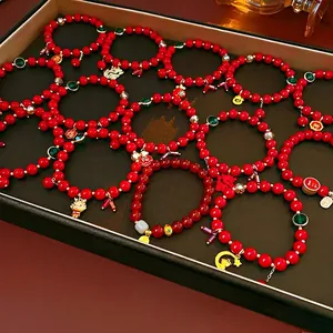 Traditional red beaded bracelets with gold Chinese Fu and zodiac dragon pendants