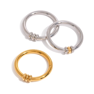 Polished 18k gold and silver stainless steel rings with three decorative moving bands