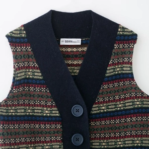 Gilet vintage in maglia jacquard con scollo a V e bottoni decorativi per donne