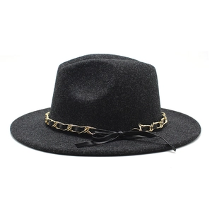 Detail of black wool fedora hat with elegant gold chain and ribbon band decoration