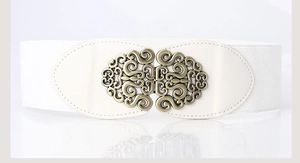 Close-up of white wide elastic waist belt with vintage hollow metal buckle on white background