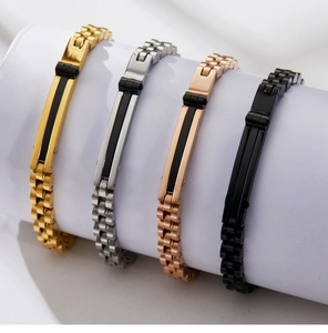 Detail of four-color watch-style bracelets in gold, silver, rose gold, and black metal