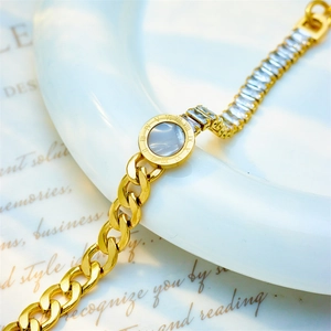 Gold chain bracelet with Cuban links, zircon stones, and Roman numeral dial pendant