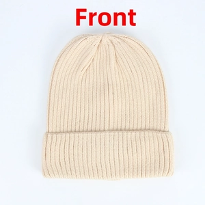 Front view of a cream-colored ribbed knit beanie with a folded cuff for winter warmth