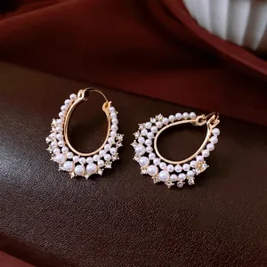 French vintage gold hoop earrings with layered pearls and sparkling zircon stones