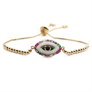 Bracelet œil de protection doré avec zircons colorés et chaîne réglable pour femme